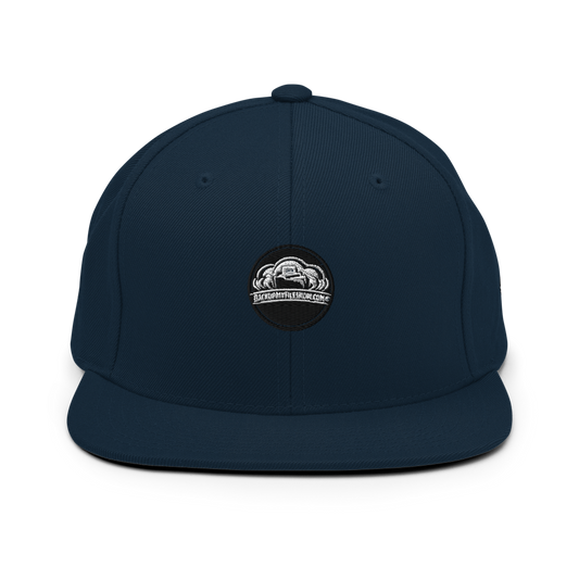 Dark navy Yupoong 6089M classic snapback cap with adjustable strap and embroidered front logo.