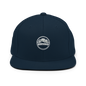 Dark navy Classic Snapback cap by Yupoong 6089M with flat brim and adjustable strap, featuring embroidered design.