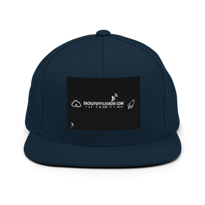 Dark navy Yupoong 6089M classic snapback cap with structured crown and flat brim, featuring adjustable snap closure.
