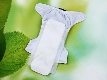 Two rolls of biodegradable viscose flushable diaper liners by BACKUPMYFILESNOW.COM®, featuring 100 sheets per roll for disposable cloth diapers.