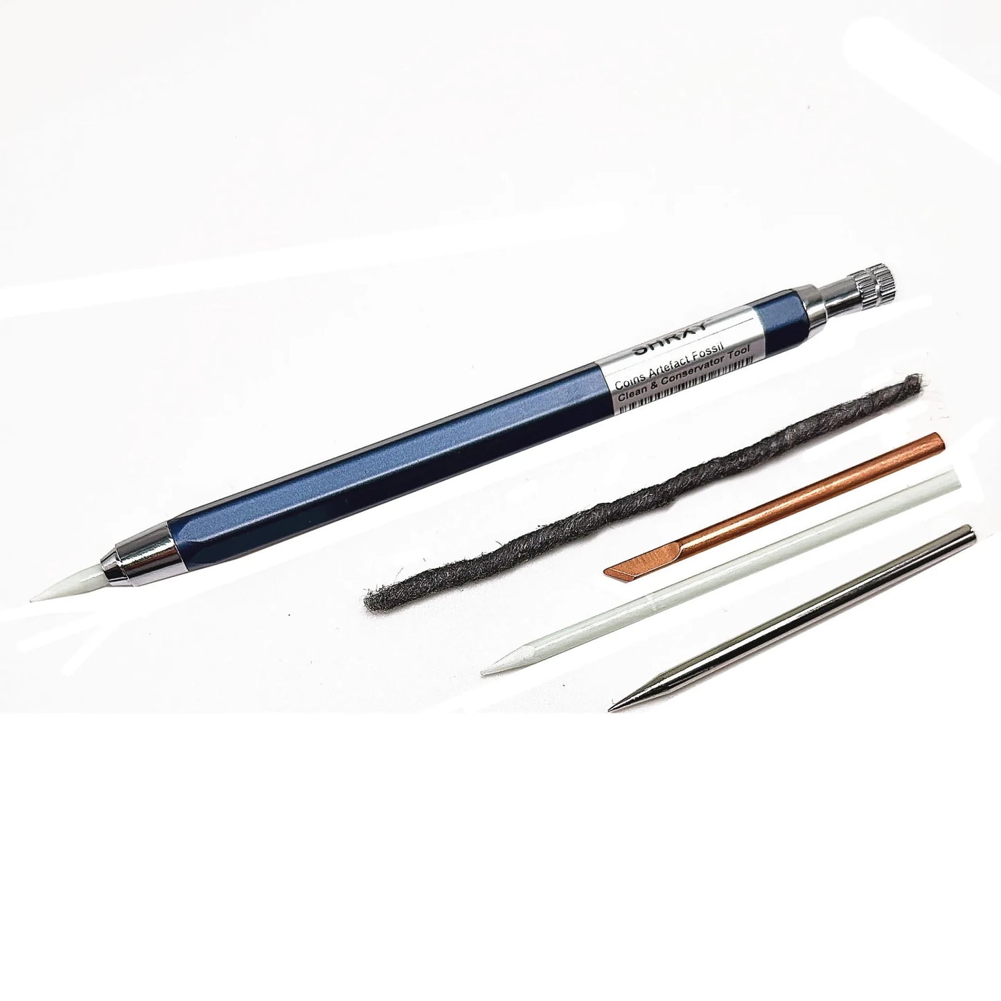 Coin cleaning composite pencil set from BACKUPMYFILESNOW.COM® with multiple cleaning pencils and a protective case.