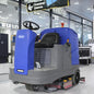 Heavy-duty industrial floor scrubber machine by BACKUPMYFILESNOW.COM® for warehouses and factories, electric ride-on cleaning equipment.