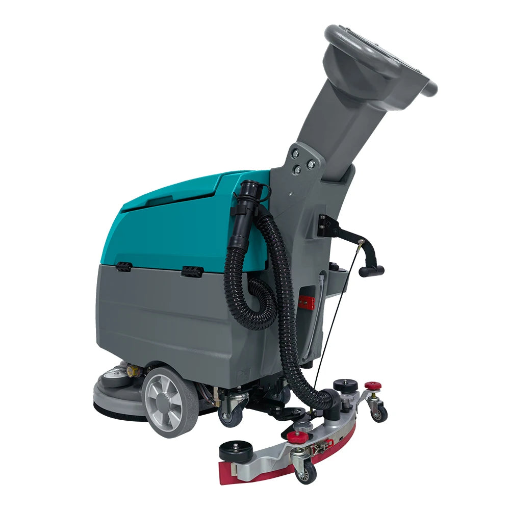 Industrial electric ride-on floor scrubber machine for warehouses and factories, used for professional cleaning and sweeping.