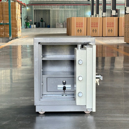 Electronic fireproof safe box with key lock by BackupMyFilesNow.com, designed for secure home and hotel storage, fire-resistant and durable.