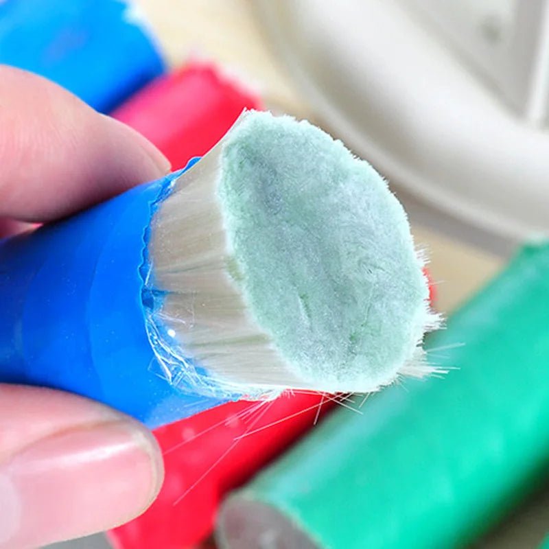 Stainless steel pan cleaning brush from BACKUPMYFILESNOW.COM® for household kitchen and metal cleaning tasks.