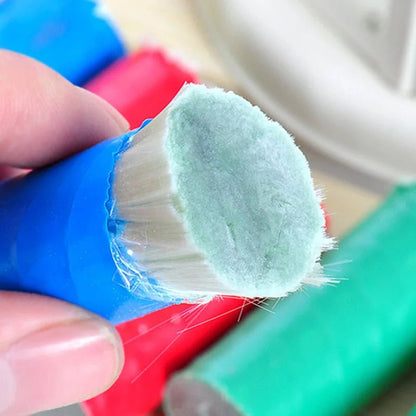 Stainless steel pan cleaning brush from BACKUPMYFILESNOW.COM® for household kitchen and metal cleaning tasks.