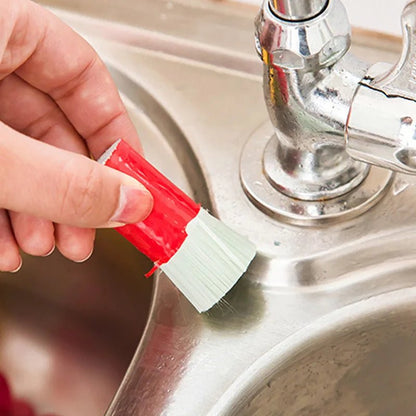 Stainless steel pan cleaning brush from BACKUPMYFILESNOW.COM® for kitchen and household metal cleaning and scrubbing tools.