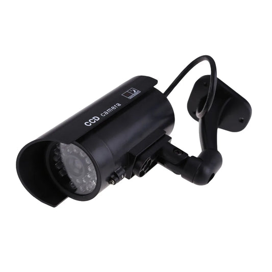 Fake security camera with blinking LED light for theft prevention, suitable for outdoor and indoor surveillance.