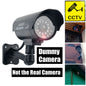 Fake security CCTV camera by Smarsecur with flashing red LED light, waterproof design for outdoor and indoor surveillance.
