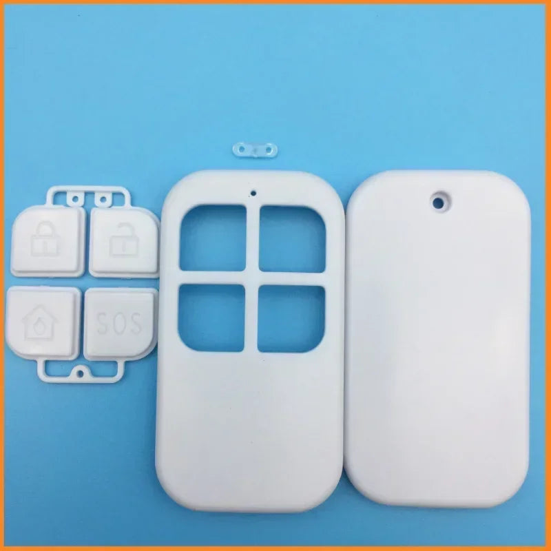 Wireless smart home security system with magnetic door/window sensor and remote alarm for garage entry protection.