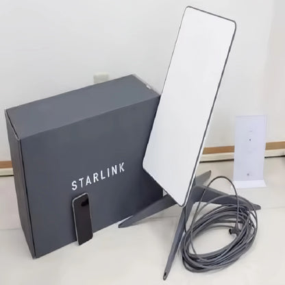 Starlink Standard Satellite Internet Kit V3 and V4 with satellite dish, router, and cables, set up outdoors for high-speed internet access