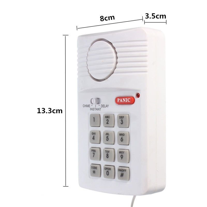 Window and door security alarm with code lock from BackupMyFilesNow.com, featuring a sleek device for home security.