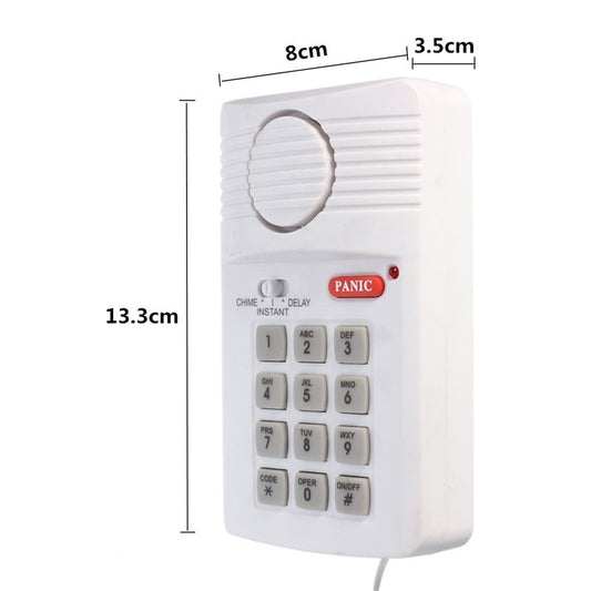 Window and door security alarm with code lock from BackupMyFilesNow.com, featuring a sleek device for home security.