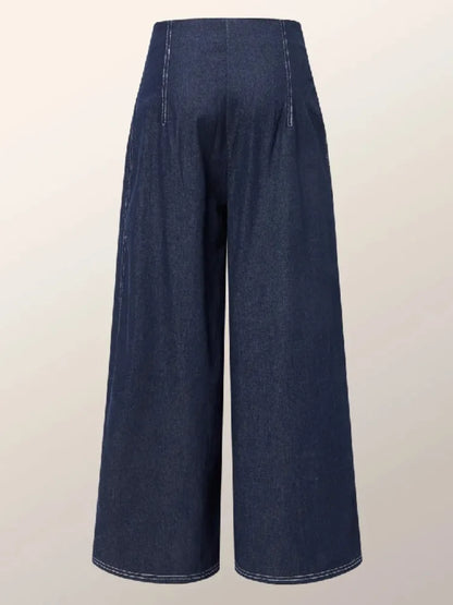Women's dark blue high waist pleated wide-leg jeans with a loose fit, styled as spring retro workwear streetwear casual trousers.