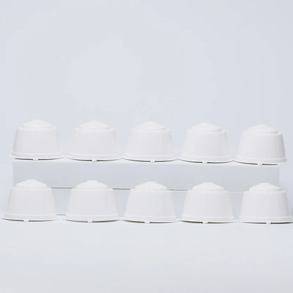 10pcs reusable refillable capsules for Nescafe Dolce Gusto coffee by BackupMyFilesNow, with spoon and brush for easy filling.