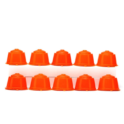 Set of 10 reusable Nescafe Dolce Gusto coffee capsules with filters, spoons, and brushes for eco-friendly coffee brewing.