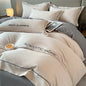 Luxury cotton bedding set with duvet cover, bed sheet, and pillowcases in solid color for king, queen, full, and twin sizes.
