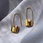 Metallic hip hop lock earrings for women, stylish piercing jewelry with a cool, everyday metallic style accessory design.