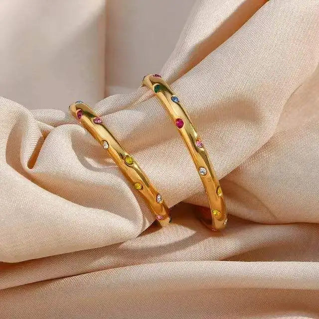 Sterling silver huggie hoop earrings for girls with gold plate and zircon accents, trendy wedding jewelry by Daidan.