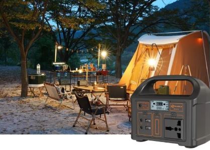 Portable power station by BACKUPMYFILESNOW.COM® with multiple USB and AC ports, compact design for charging on the go.