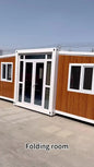 Expandable BACKUPMYFILESNOW.COM® container house with spacious interior, 40ft prefabricated modular home for family living and gatherings.