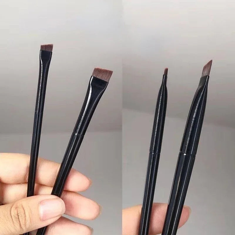 Flat fine blade makeup brush for eyebrows and eyeliner, professional cosmetic tool for precise contouring and defining.