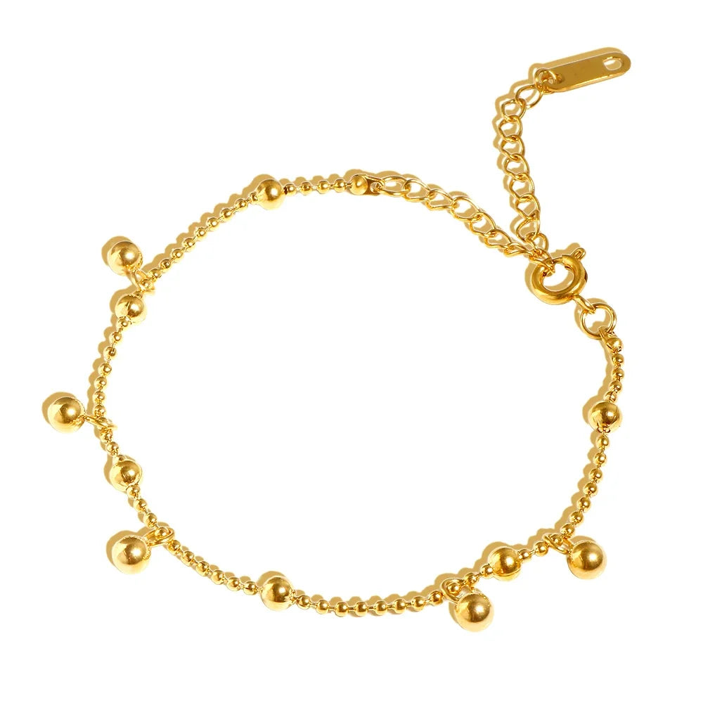 Stainless steel bohemian style personalized anklet with intricate design and adjustable chain for a stylish, custom jewelry look.