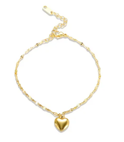 Stainless steel bohemian-style personalized anklet with intricate design and adjustable chain on a white background.