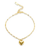 Stainless steel bohemian-style personalized anklet with intricate design and adjustable chain on a white background.