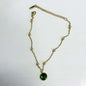 Stainless steel bohemian-style personalized anklet with intricate charms and adjustable chain design.