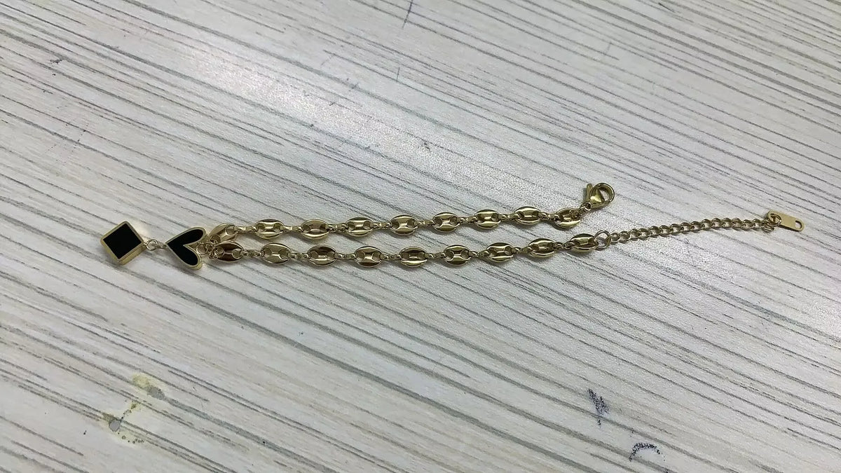 Stainless steel bohemian style personalized anklet with intricate design and adjustable fit, perfect for a casual or boho look.