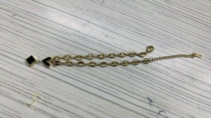 Stainless steel bohemian style personalized anklet with intricate design and adjustable fit, perfect for a casual or boho look.