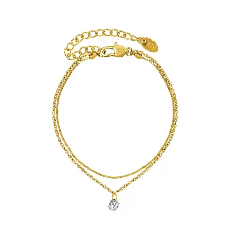 Stainless steel bohemian style personalized anklet with intricate charms, featuring adjustable chain and custom engraving for a unique look.