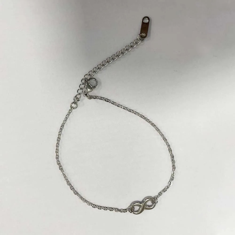 Stainless steel Bohemian style personalized anklet with intricate design and adjustable chain for a unique, custom jewelry look.