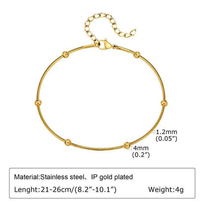 Stainless steel bohemian style personalized anklet with intricate design and adjustable chain on a white background