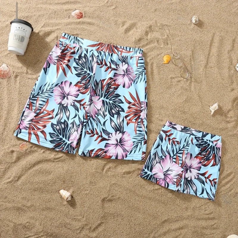 Floral pattern ruffle one-piece swimsuit for girl and matching swim shorts for boy, ideal family matching beachwear for summer.