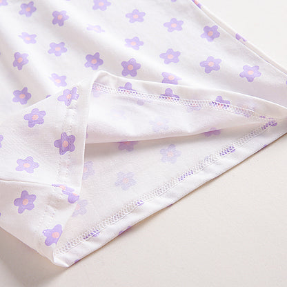 Baby girls' soft cotton undershirt with suspenders, pink and white, featuring adjustable straps and comfortable fit.