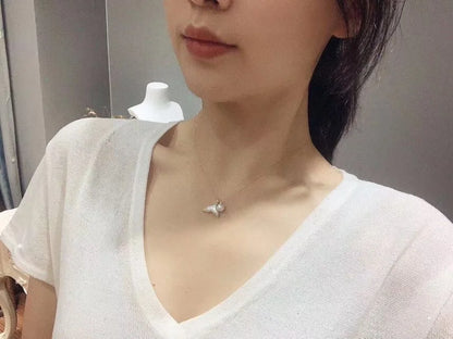 Fresh water pearl jewelry necklace with pearl pendant, 925 silver setting, simple design, 40.5cm length, mother of pearl accents.