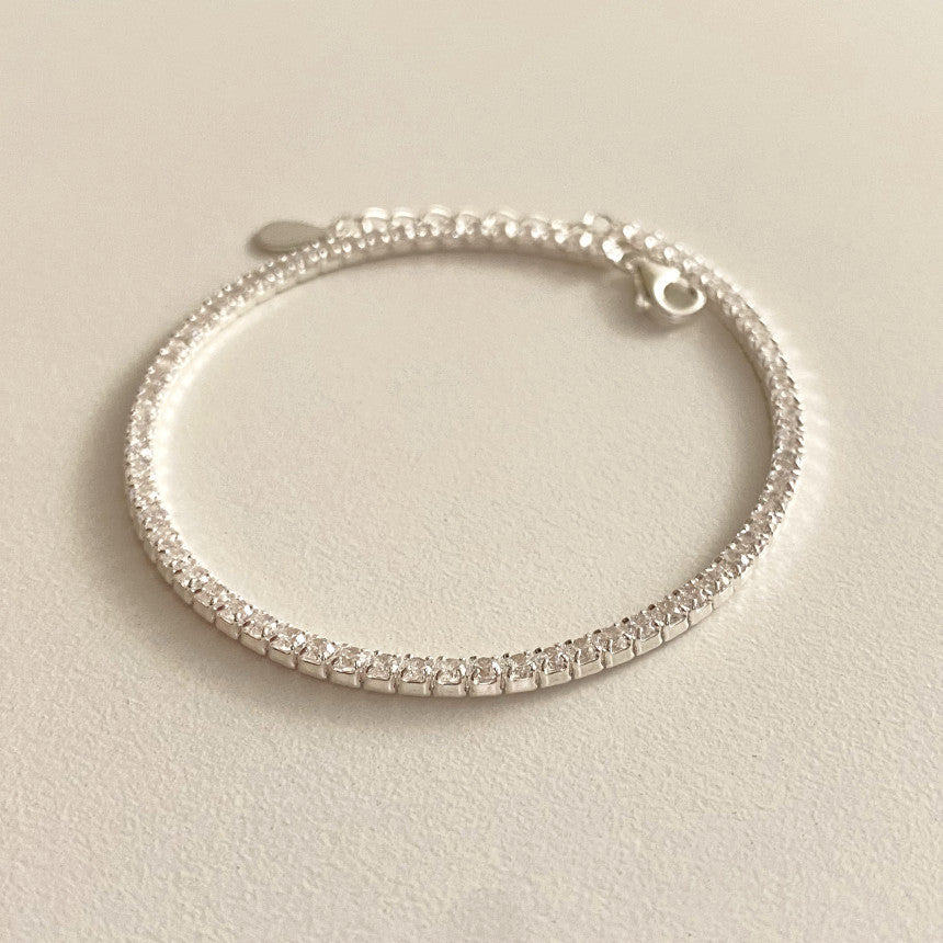 Simple 925 sterling silver zircon diamond bracelet featuring sparkling stones and a sleek design.