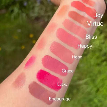 Rare Beauty liquid blush in a natural, long-lasting muddy pink shade, featuring glossy, moisturized cheek application.