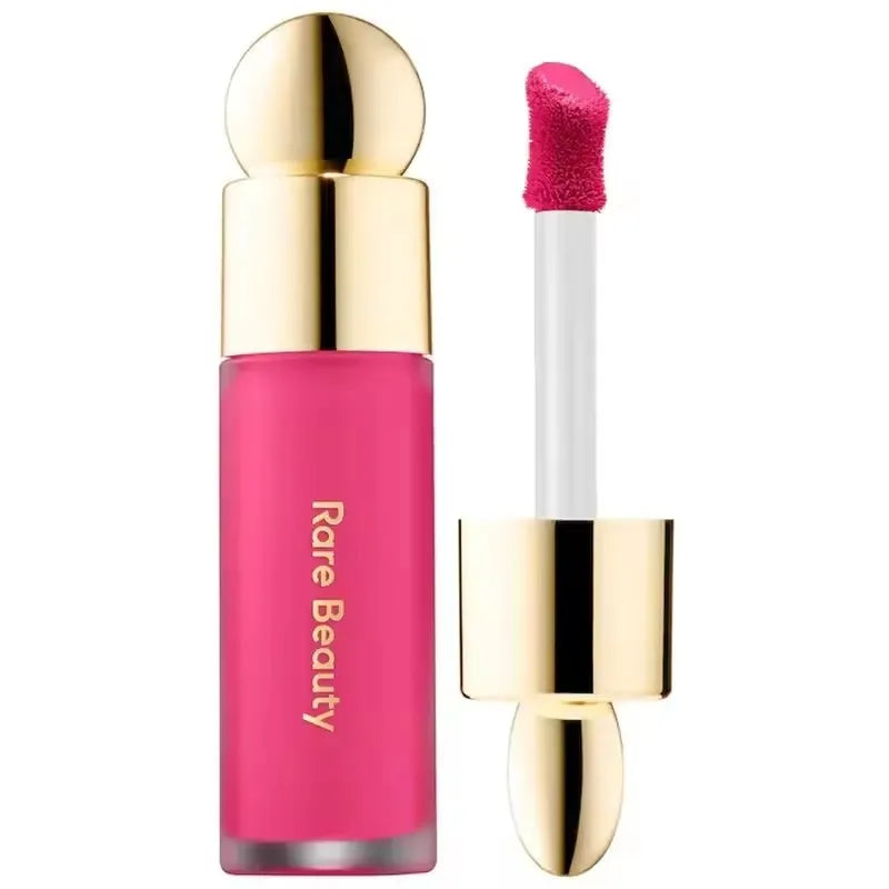 Rare Beauty liquid blush in natural, long-lasting muddy shade with glossy, moisturizing finish on face makeup cheek cheek.