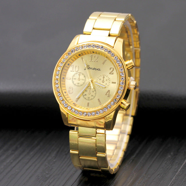 Gold Geneva Classic stainless steel women's quartz watch with a sleek round face and elegant band, showcasing luxury and style.