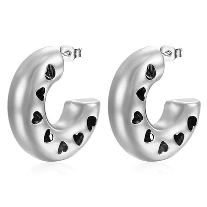 Gold-plated stainless steel hollow heart earrings with vintage C-shape design, polished finish, and 18K gold plating for women.