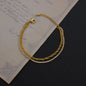 Women's stainless steel bead claw chain necklace with simple design, featuring small round beads and claw clasp detail.