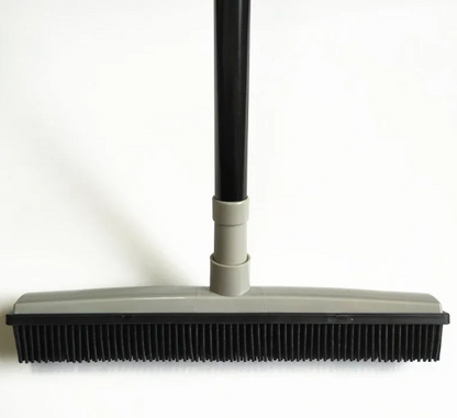 Grass green pet hair removal broom mop by BackupMyFilesNow.com shown with bristles designed for effective pet hair cleanup.