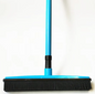Grass green pet hair removal broom mop from BackupMyFilesNow.com showing its textured surface for effective pet hair pickup.