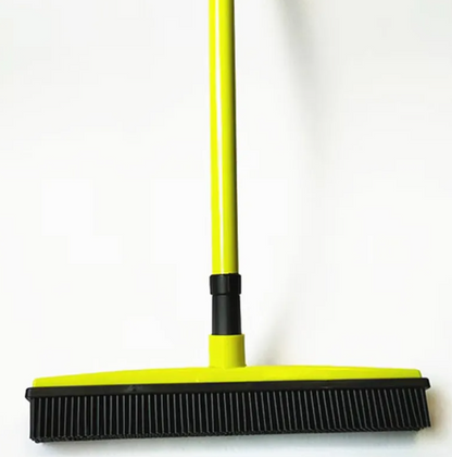 Green pet hair removal broom mop by BackupMyFilesNow.com with a sturdy handle and textured surface for effective hair picking.