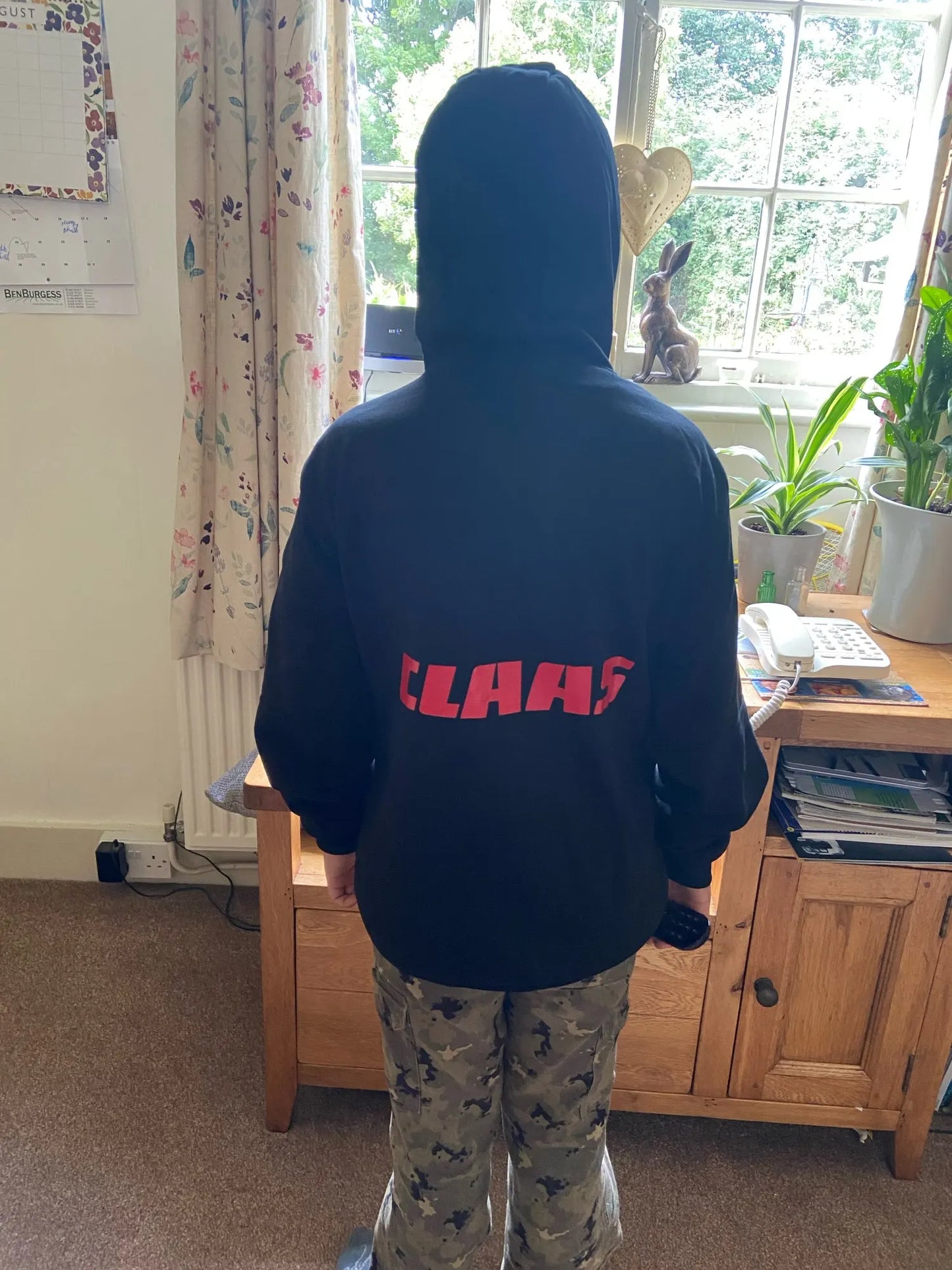 Gray SpaceX hoodie with Space X logo and NASA graphic, men's hooded jacket featuring zipper closure and outerwear style.
