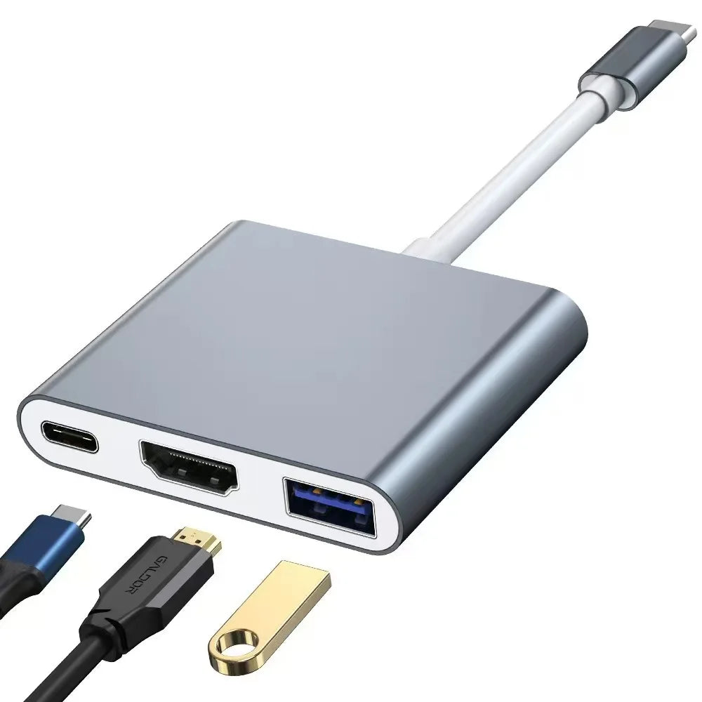 Gray 3-in-1 USB-C hub by BackupMyFilesNow.com with USB-C, HDMI 4K, and USB 3.0 ports on a modern device.