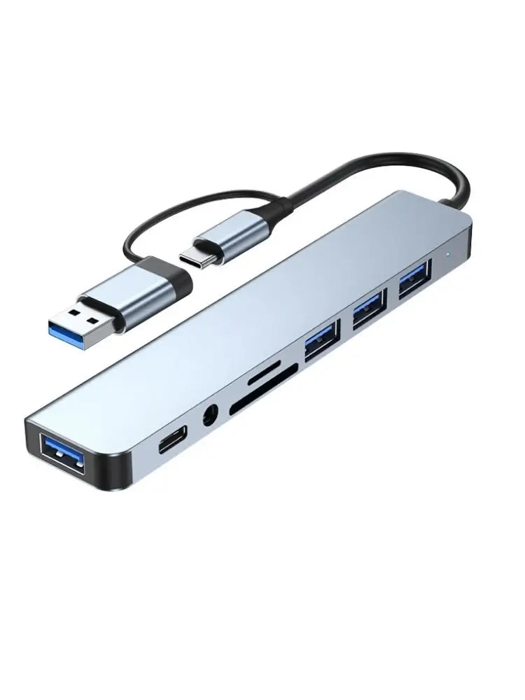 Gray 3-in-1 USB-C hub with PD 100W, 4K HDMI, and USB 3.0 ports for versatile device connectivity.